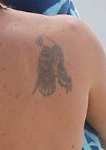 Keith Urban Tattoo on back