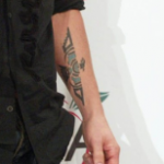 Keith Urban Tattoo on left hand arm