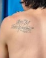 Mitchel Musso Tattoo on back -
