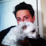 Shane Harper with his pet dog