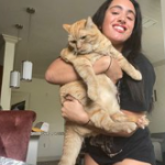Simone Alexandra Johnson with her pet cat