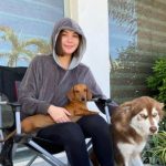 Ashley Ortega with her pet dogs -