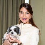 Gabriela Isler with her pet dog-