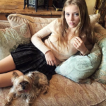 Grace Van Dien with her pet dog-