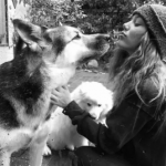 Grace Van Dien with her pet dogs