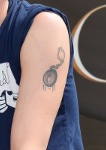 Jamie Campbell Bower Tattoo on left hand