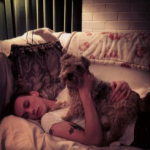 Jamie Campbell Bower with his pet dog