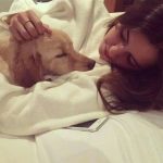 Paulina Vega Dieppa with her pet dog-