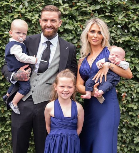 Aaron Chalmers with her wife and children