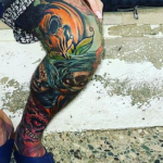 Aaron Chalmers's left leg tattoos