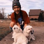 Avani Gregg with her pet dogs