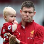 James Milner with his son