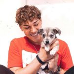Noah Beck with his pet dog