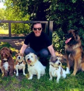 Ricky Gervais with his pet dogs