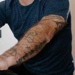 Robbie Williams's lefthand tattoos