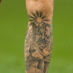 Aaron Ramsey Tattoo on left leg