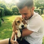 Aaron Ramsey with his pet dog