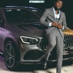 Abisi Emmanuel with his mercedese car