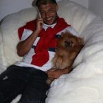 Alex Oxlade Chamberlain with his pet dog
