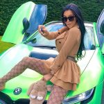 Chloe Khan with her BMW car