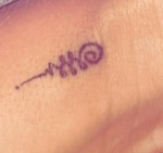 Dani Dyer with Tattoo -
