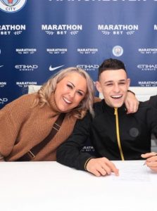 Phil Foden with his mother Claire Foden
