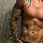 Dan Osborne's right hand and chest tattoos