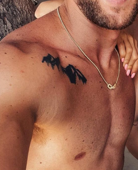 Jacob Riglin's right chest tattoos