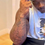 Adebayo Akinfenwa's right hand tattoos