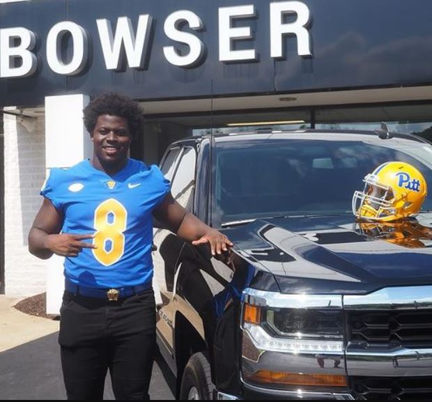 Calijah Kancey with his FORD car