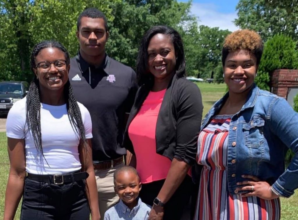 Tyree Wilson with mother and siblings