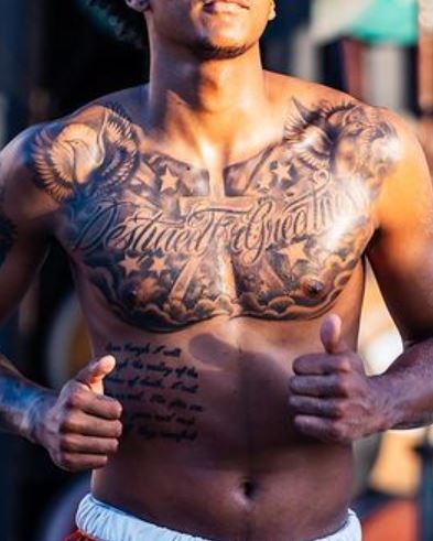 Dillon Mitchell chest tattoos