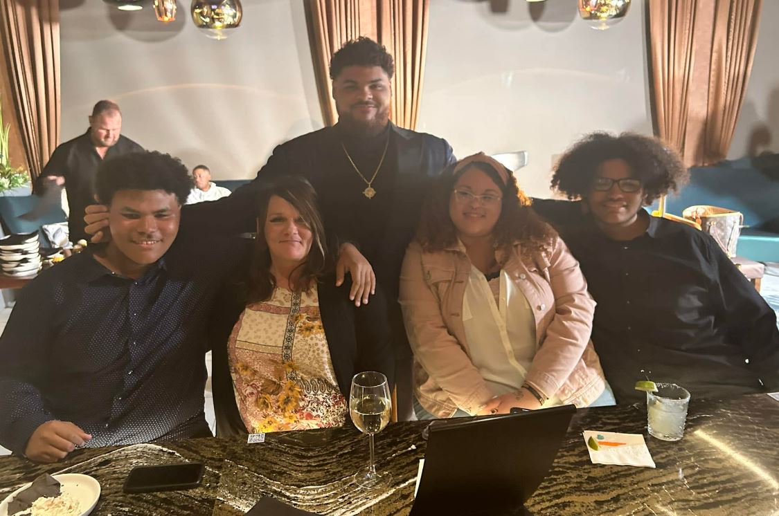 Darnell Wright with his mother and siblings