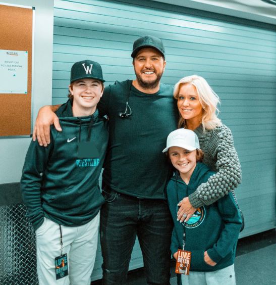 luke bryan with his wife and children