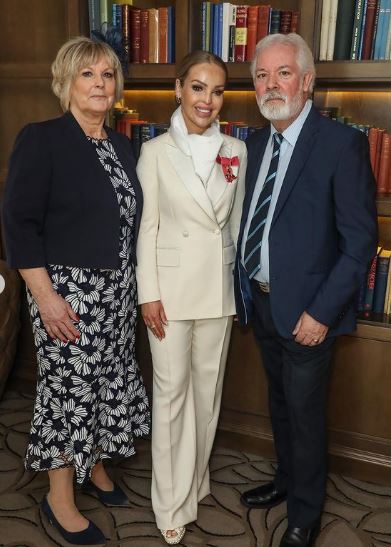 Katie Piper with her parents
