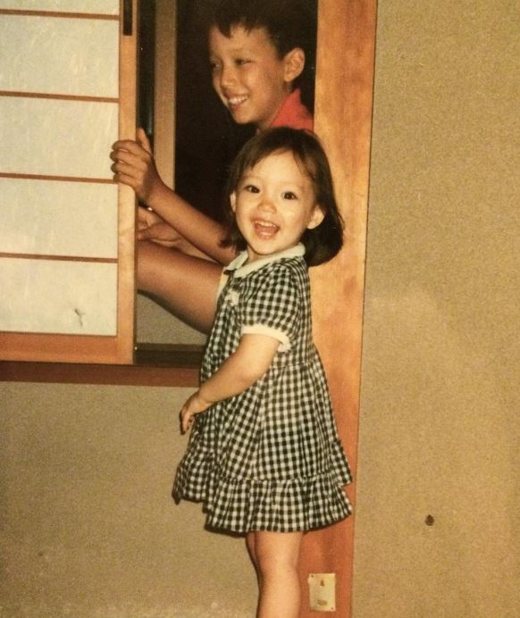 Pom Klementieff with her brother
