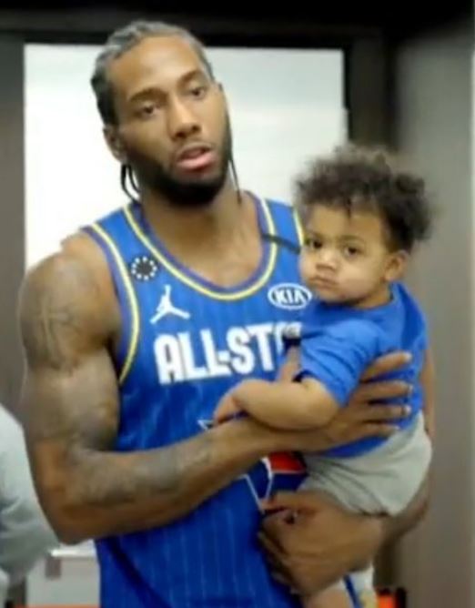 Kawhi Leonard with son