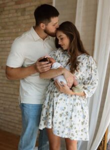 Tucker Kraft with wife and daughter Charlotte