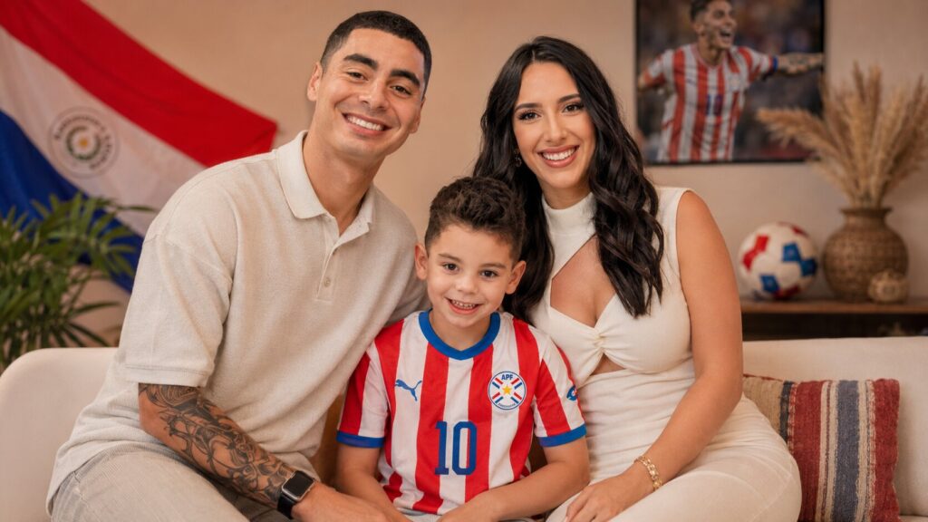 Miguel Almirón smiling confidently with his wife Alexia Notto and young son Francesco in a family setting